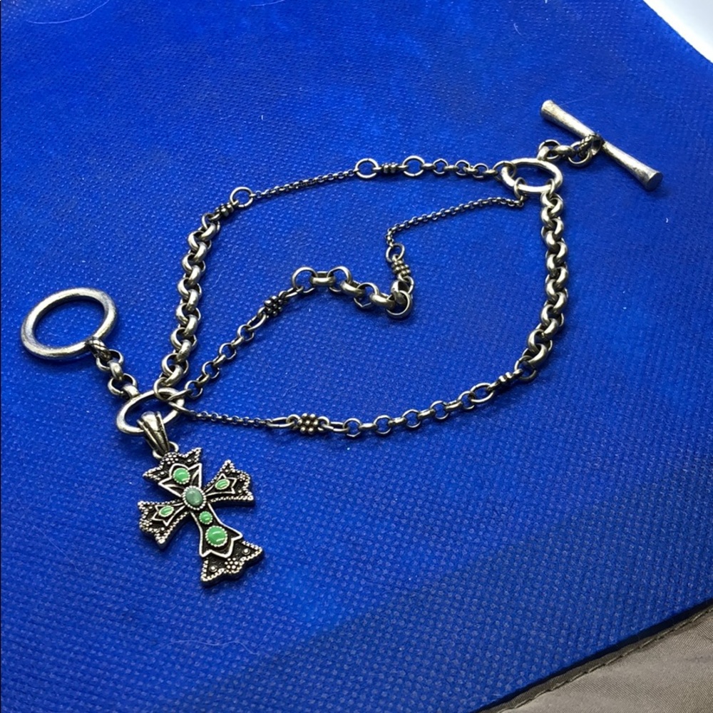 Silver bracelet with silver cross